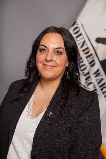 headshot of a woman in a black jacket